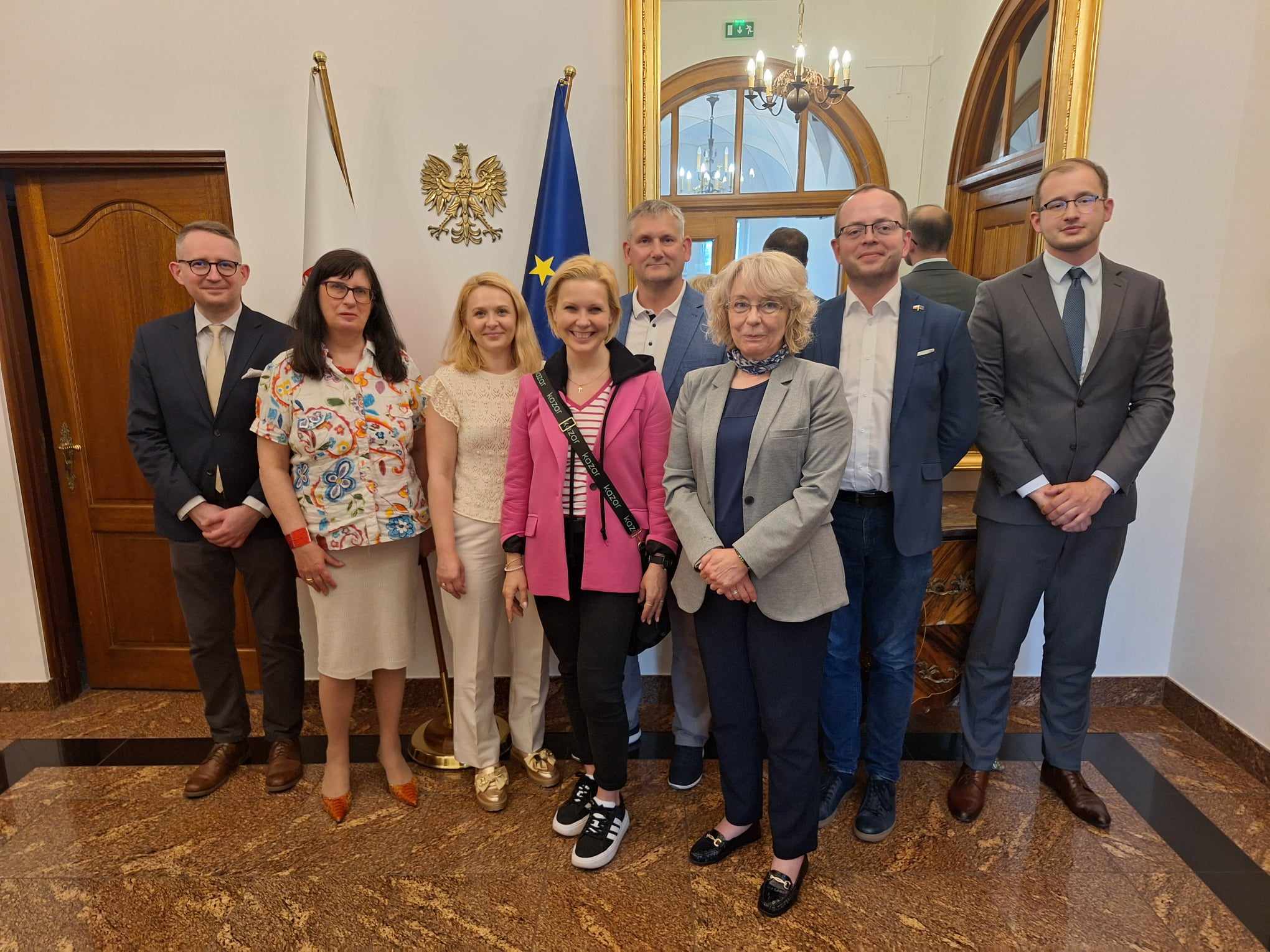 The photo shows the team members with Iwona Marczyk Stępniewska